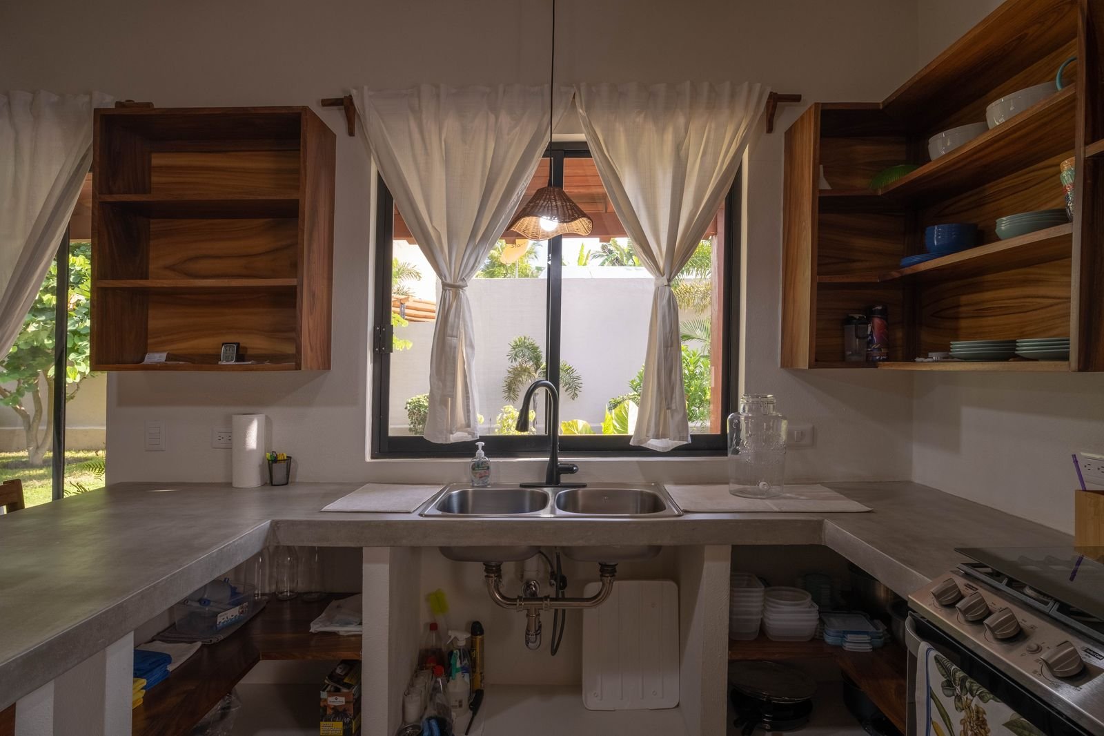 Kitchen window at Casa Nisha looking out onto the tropical garden